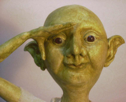 Paperclay Snitches face with glass eyes